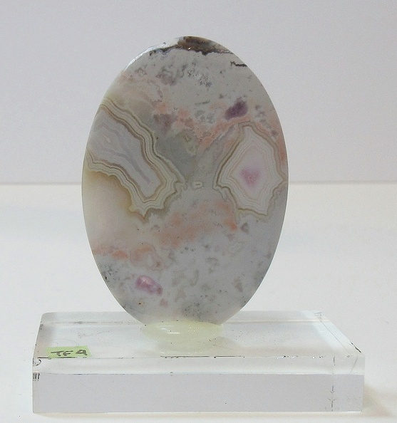 TF4 - Five-Islands porcelain agate with small amethyst pockets, 2 sided stone.jpg